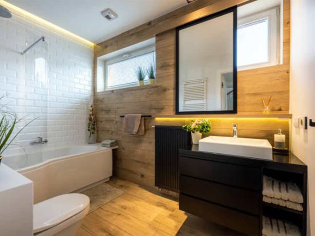 Modern small bathroom in stylish apartment white and wooden finishing