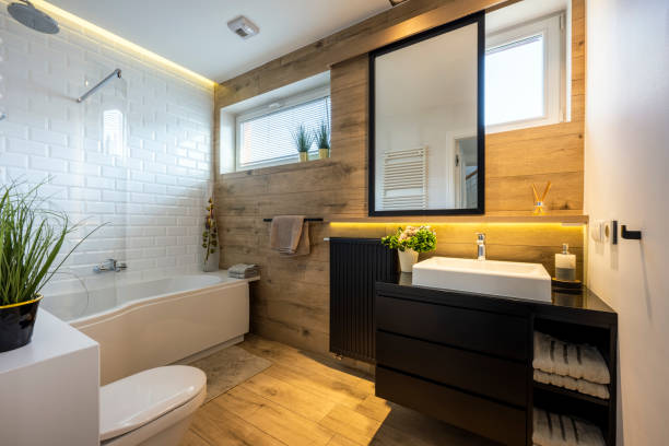 Modern small bathroom in stylish apartment white and wooden finishing